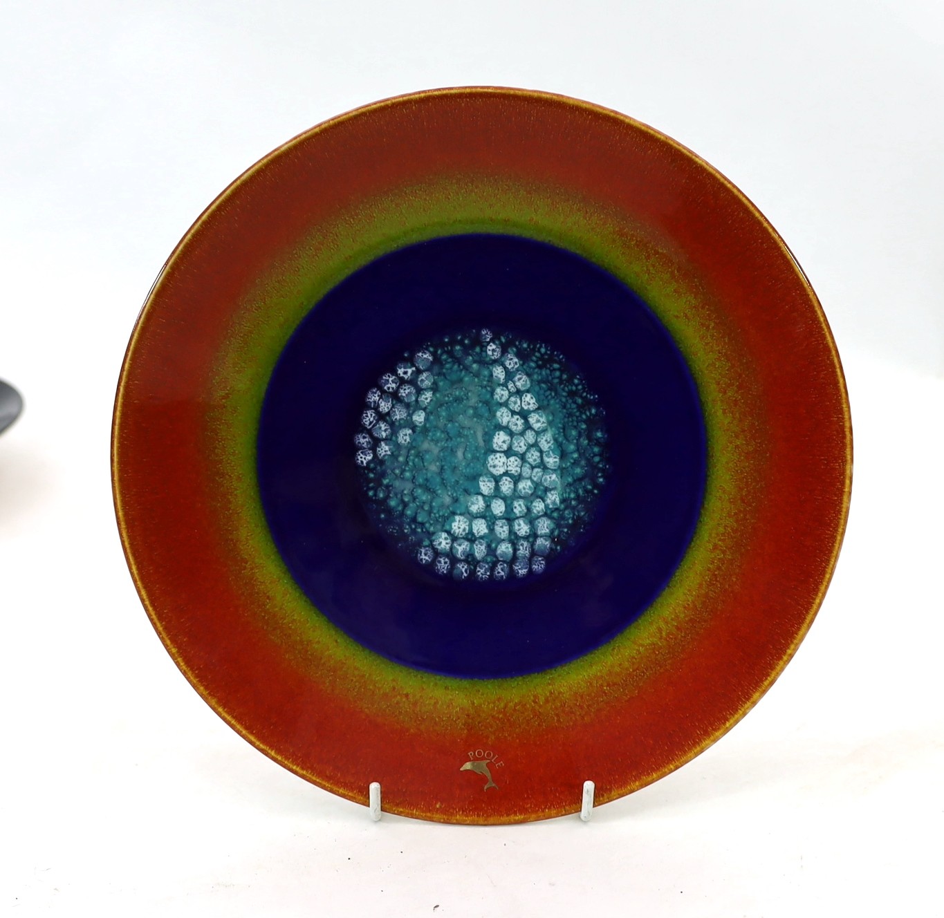 Alan Clarke for Poole Pottery. A set of nine ‘Alignment of the Planets’ chargers and one duplicate, c.2000, 26cm diameter